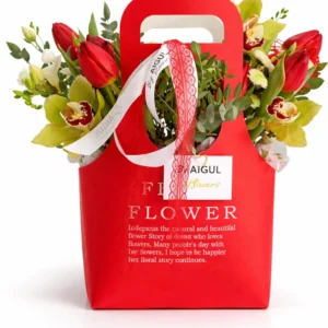 Blumenarrangement in einer hochwertigen Geschenktüte